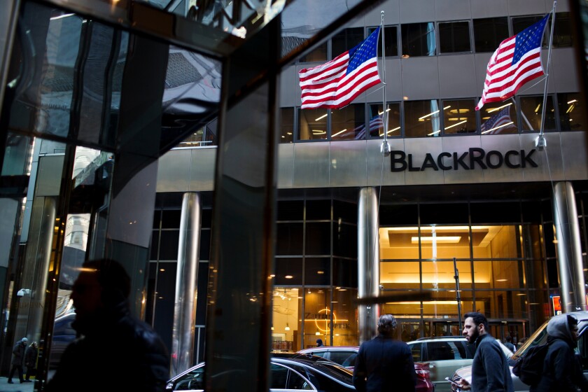 Pedestrians pass in front of BlackRock Inc. headquarters in New York, U.S., on Friday, Jan. 11, 2019. BlackRock Inc. is scheduled to release earnings figures on January 16. Photographer: Gabriella Angotti-Jones/Bloomberg