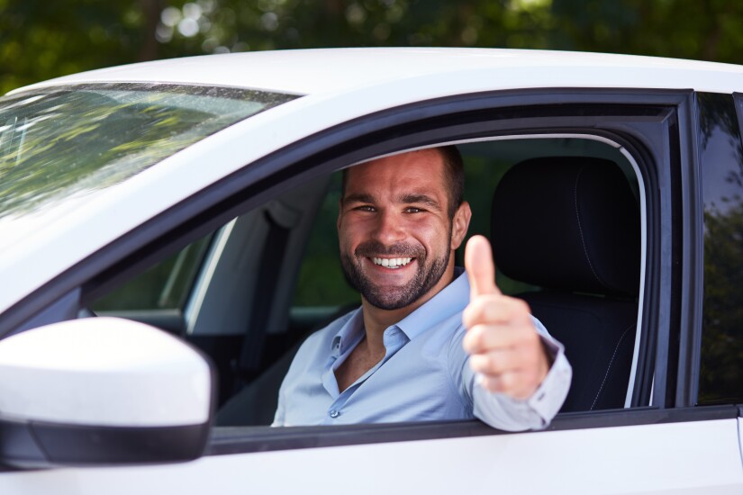 driver giving thumbs up