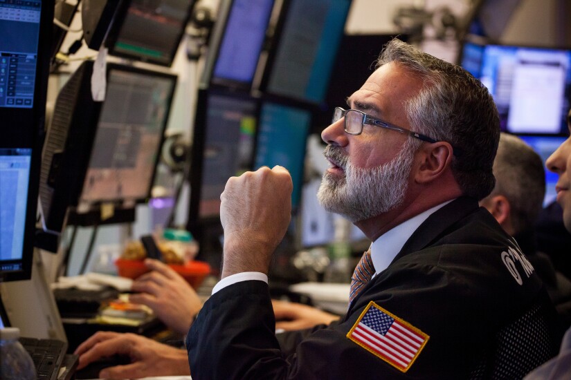 bearded stock exchange trader Bloomberg News