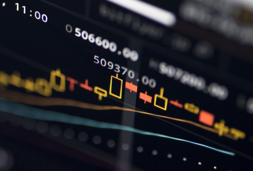 A chart of bitcoin prices against Japanese yen is displayed on a computer monitor via software for trading virtual currencies in Tokyo.