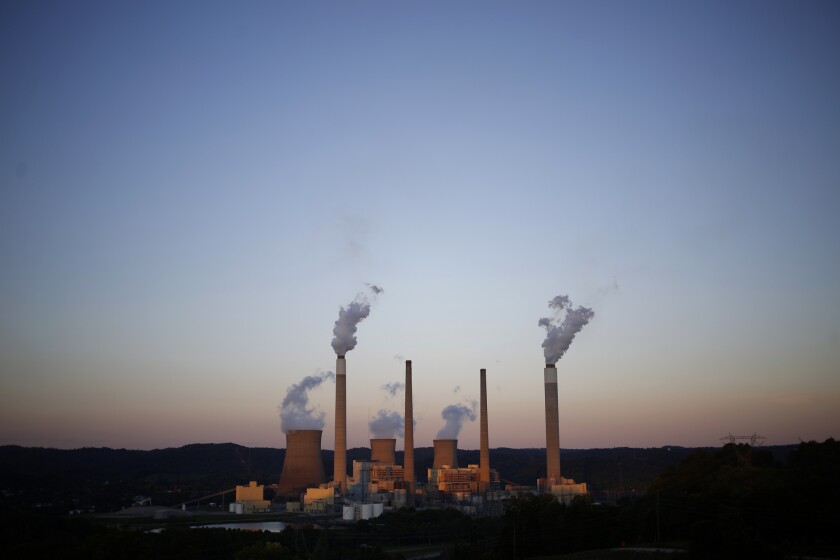 Emissions rise from the American Electric Power Co. coal-fired John E. Amos Power Plant in Winfield, West Virginia.