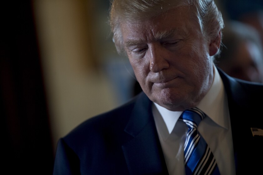 President Donald Trump pauses while participating in a Made in America event at the White House