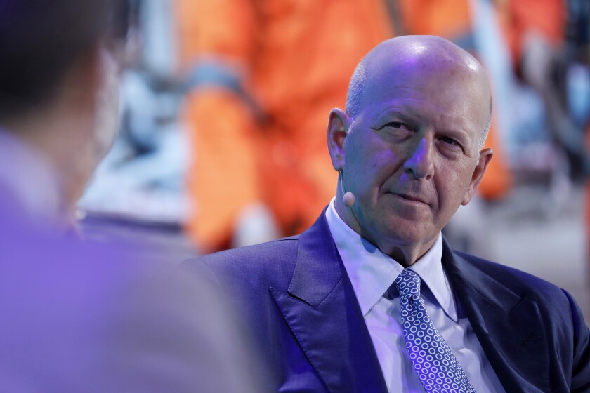 David Solomon, chief executive officer of Goldman Sachs & Co., listens during a panel discussion at the Bloomberg New Economy Forum in Singapore, on Wednesday, Nov. 7, 2018. The New Economy Forum, organized by Bloomberg Media Group, a division of Bloomberg LP, aims to bring together leaders from public and private sectors to find solutions to the world's greatest challenges. Photographer: Justin Chin/Bloomberg