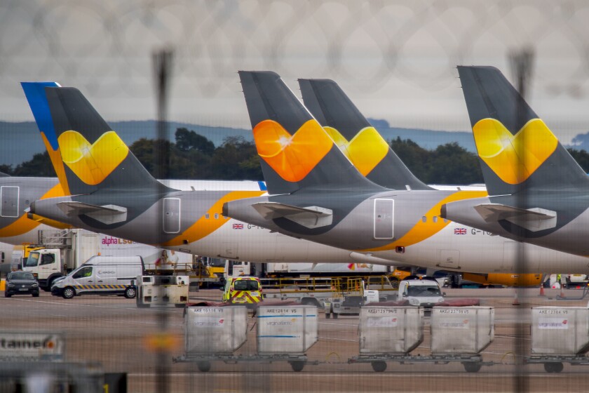 Passenger aircraft operated by Thomas Cook Group Plc sit on the tarmac at Manchester Airport in Manchester, U.K., on Monday, Sept. 23, 2019. Photographer: Anthony Devlin/Bloomberg