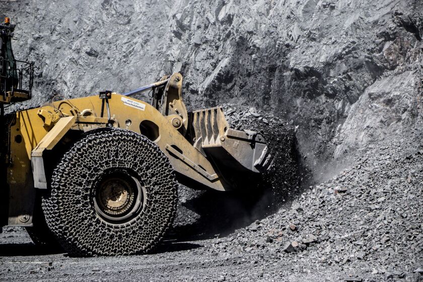A front loader scoops up freshly blasted rock containing iron ore at the Yeristovo and Poltava iron ore mine, operated by Ferrexpo Poltava Mining PJSC, in Poltava, Ukraine.