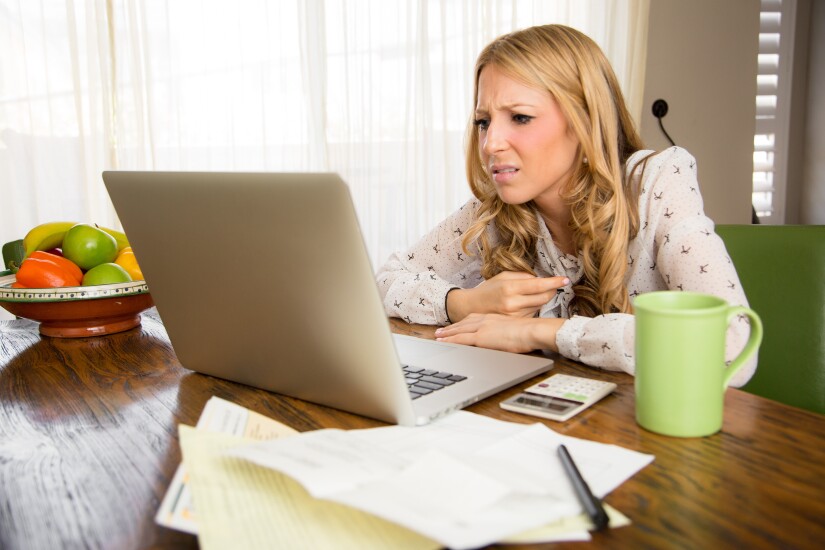 Woman confused at computer