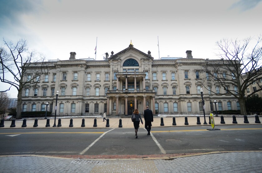 The New Jersey State House stands in Trenton, New Jersey, U.S., on Tuesday, March 11, 2014. New Jersey's pension system is underfunded by $52 billion after a decade of expanded benefits and missed payments, Governor Chris Christie said last month. Photographer: Ron Antonelli/Bloomberg