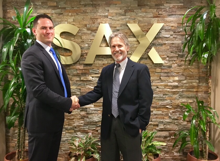 Kyle Stawicki (left), partner-in-charge of Sax Wealth Advisors, and Gregory Duffy (right), founder of Sterling Portfolio Management, now wealth advisor at SWA