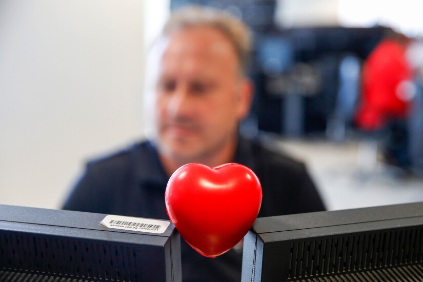 heart with computer by Bloomberg News