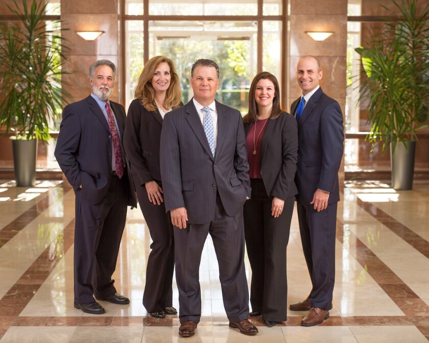 The Reese Williams Wealth Management Group left wirehouse Merrill Lynch for regional BD Stifel Financial. Pictured from left to right: George Reese, Teresa Black, Bart Reese, Kendall Elkins and Zachary Williams.