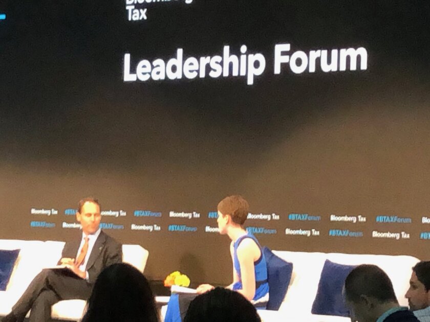 IRS Chief Counsel Michael Desmond (left) talking with Bloomberg Tax senior news editor Colleen Murphy at Bloomberg Tax Leadership Forum
