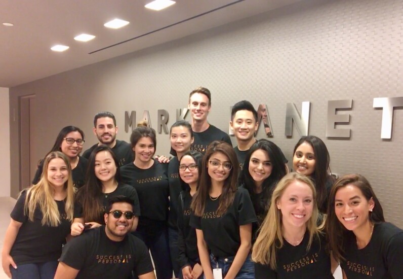 Marks Paneth employees in New York assembled for a photo when the firm launched its "Success is Personal" branding campaign.