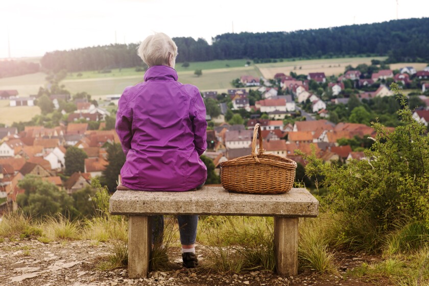elderly woman on vacation bench travel 12/13/2018