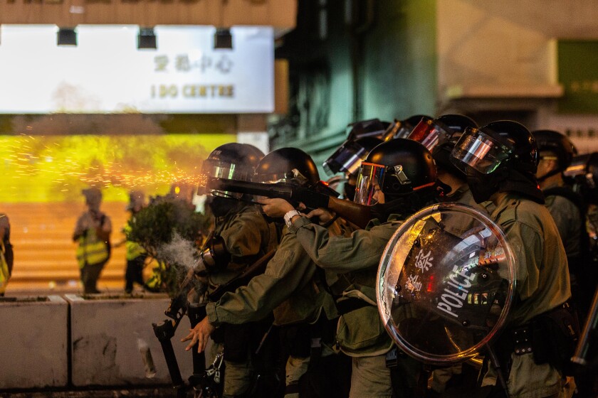 Demonstrators March in Hong Kong's Kowloon As Protest Leaders Ignore Police Ban