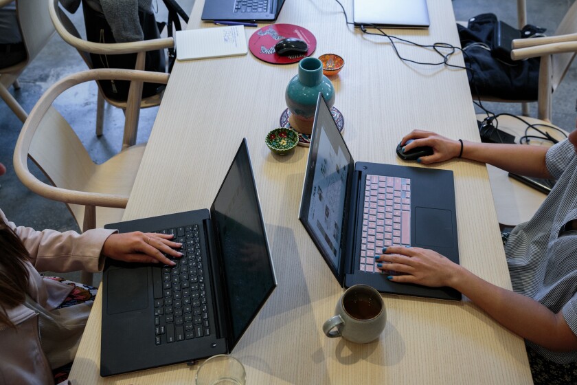 millennial-next gen-office-typing-younger-shared office space-Bloomberg