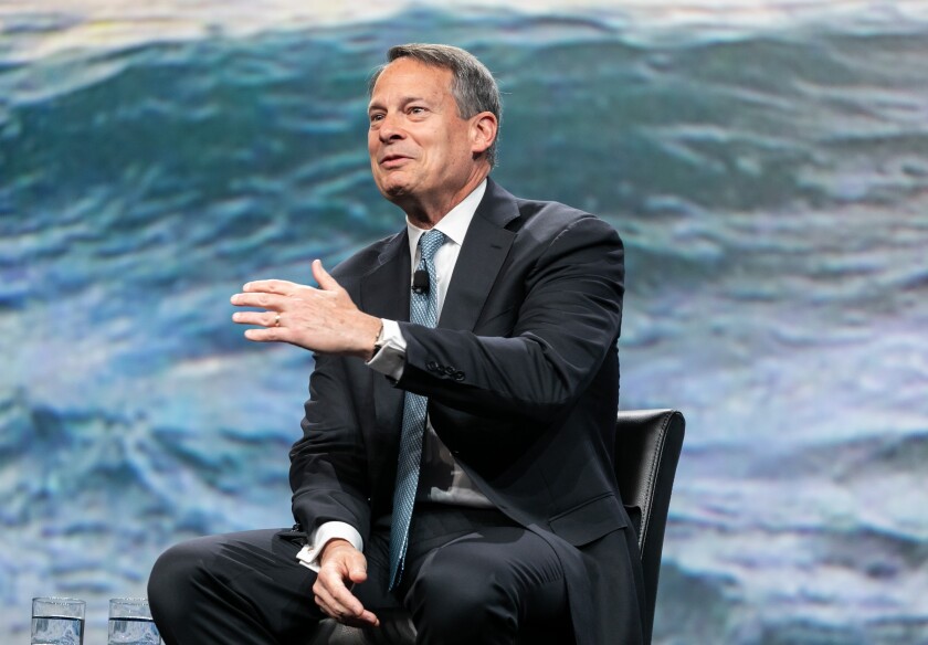 Walt Bettinger Schwab pic from Impact 2019.jpg