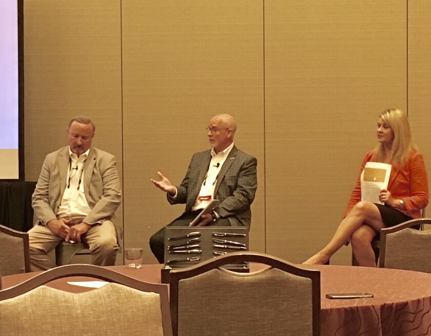 Dan Brooks, Carl Peterson and Angie Grissom