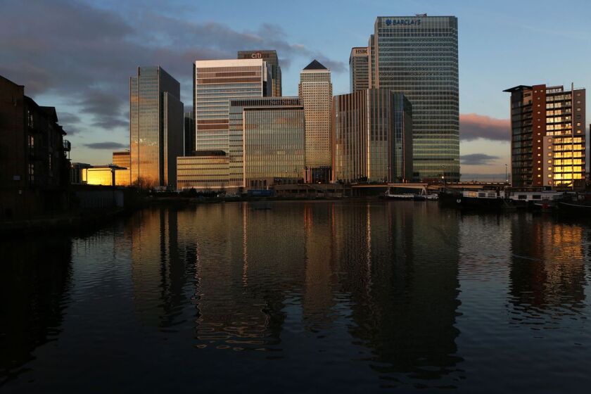 The headquarters of Barclays and HSBC Holdings stand among the offices of Citigroup, State Street and other financial firms in the Canary Wharf business district of London.