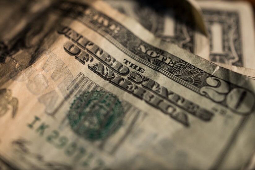 money dollar bills bloomberg