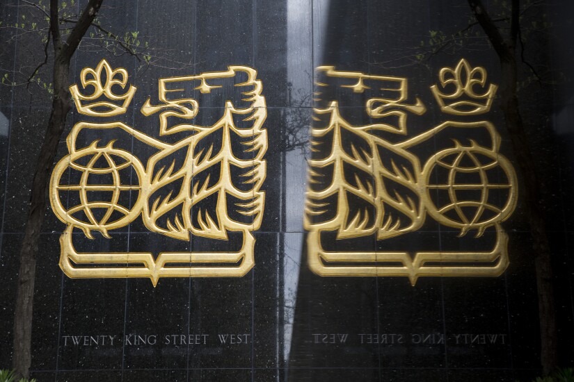 RBC logo is reflected on a surface in Toronto, Ontario, Canada, on Friday, May 19, 2017 Bloomberg News