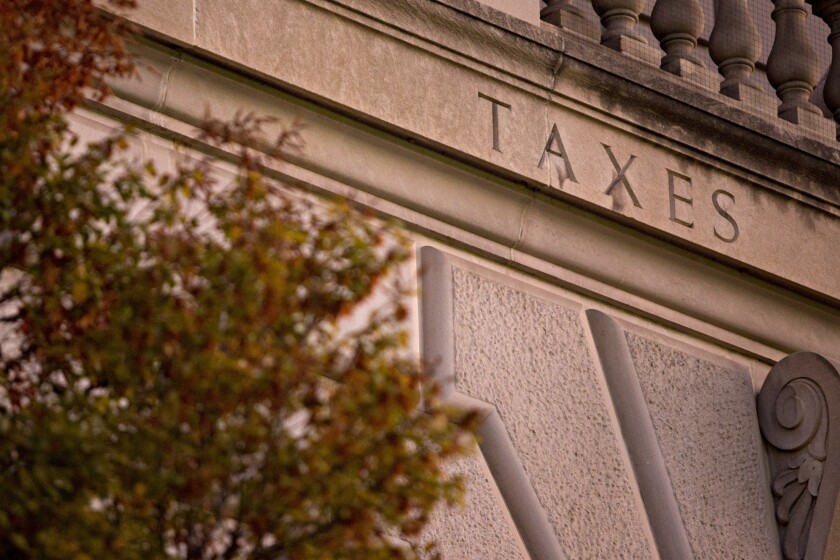The word "Taxes" on the facade of the IRS headquarters in Washington, D.C.