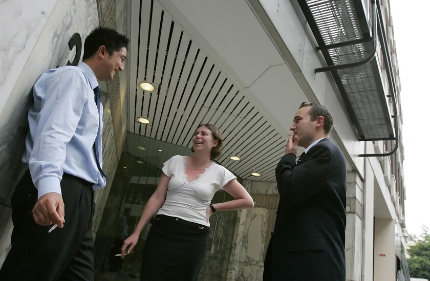 Office workers smoking