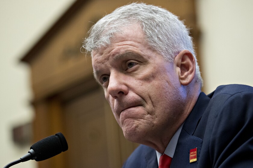 Tim Sloan, president and chief executive officer of Wells Fargo & Co., listens during a House Financial Services Committee hearing in Washington, D.C., U.S., on Tuesday, March 12, 2019. Wells Fargo & Co. stock is underperforming Tuesday pre-market as Sloan prepares to appear before a House committee focused on what it's calling a "pattern of consumer abuses." Photographer: Andrew Harrer/Bloomberg