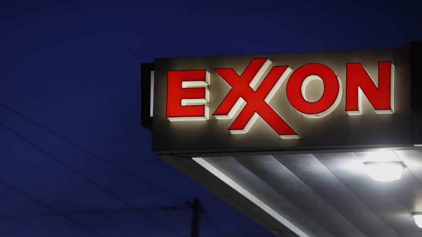 Exxon Mobil Corp. signage at a gas station in Richmond, Kentucky