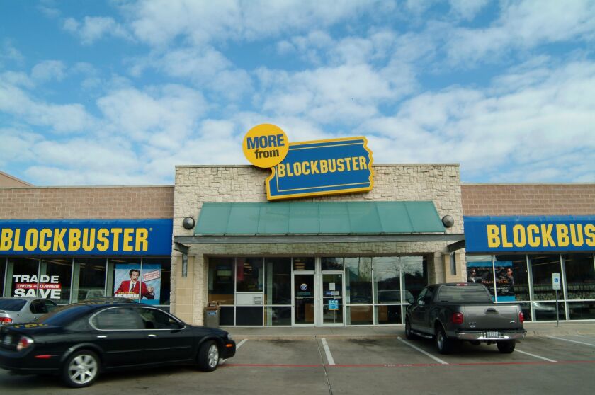 This is a Blockbuster video store in Dallas, Texas, December 28, 2004. Blockbuster Inc., the largest U.S. video store chain, threatened to make a $700 million hostile takeover offer for Hollywood Entertainment Corp. after failing to reach an agreement with an earlier bid. Photographer: Jason Janik/Bloomberg News