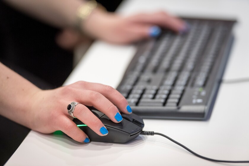 di-using-computer-stock-041619.jpg