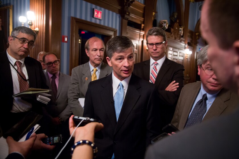 Representative Jeb Hensarling, a Republican from Texas and chairman of the House Financial Services Committee, center, speaks to the media after unveiling the Financial Choice Act June 7, 2016 Bloomberg News