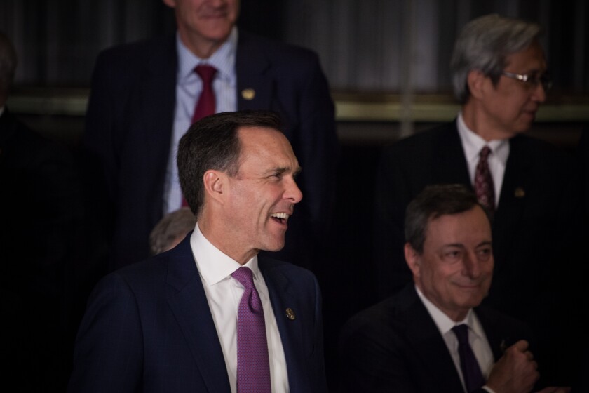 Bill Morneau, Canada's minister of finance, attends the family photo during the G-20 finance ministers and central bankers meetings in Buenos Aires, Argentina.