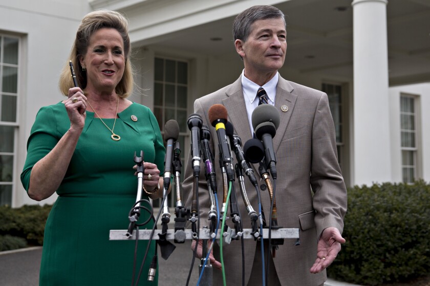 Representative Ann Wagner, a Republican from Missouri, left, speaks as Representative Jeb Hensarling, a Republican from Texas and chairman of the House Financial Services Committee, listens during a news conference after attending an executive order signing by U.S. President Donald Trump, not pictured, at the White House in Washington, D.C., U.S., on Friday, Feb. 3, 2017. Trump signed two directives aimed at staring the process of rolling back the regulatory system put in place after the financial crisis. Among the targets are rules that protect against predatory lenders, force brokers to lower fees for retirees and ban proprietary trading.