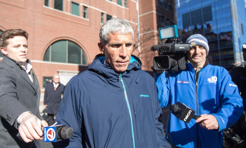 William "Rick" Singer leaves Boston Federal Court.