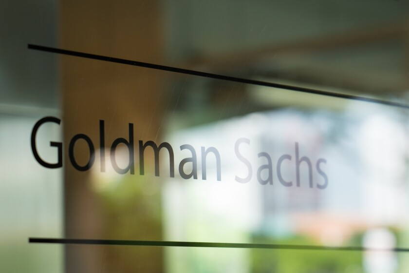 Signage for Goldman Sachs Group Inc. is displayed at the One Raffles Link building, which houses one of the Goldman Sachs (Singapore) Pte offices, in Singapore, on Saturday, Dec. 22, 2018. Singapore has expanded a criminal probe into fund flows linked to scandal-plagued 1MDB to include Goldman Sachs Group, which helped raise money for the entity, people with knowledge of the matter said. Photographer: Nicky Loh/Bloomberg