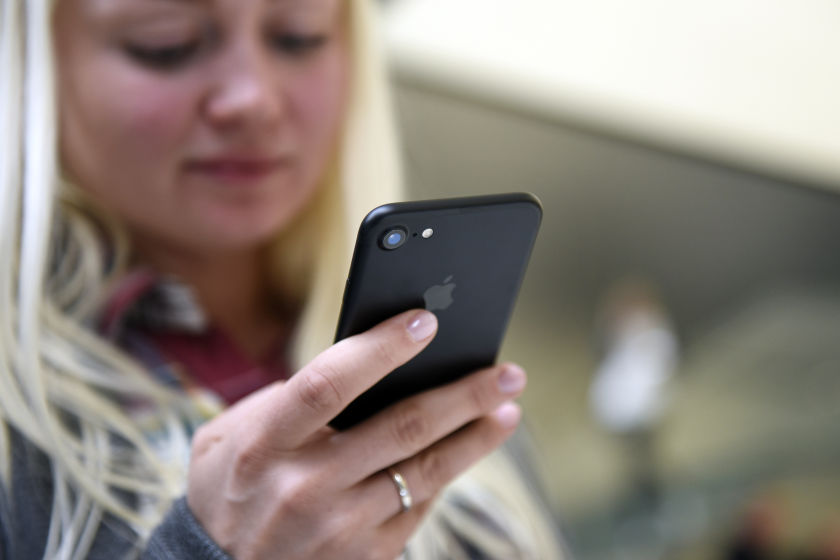 iphone-young-millennial-bloomberg-news
