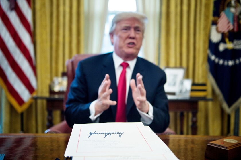 President Trump after signing the tax reform bill in December 2017.