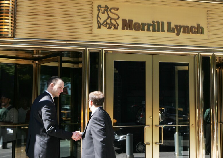 Merrill Lynch By Bloomberg News men shaking hands