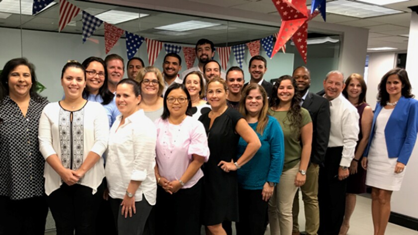 Staff members from Miami's Vizcaino Zomerfeld