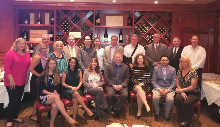 Members of the combined UHY Advisors and Del Conte, Hyde, Annello & Schuch: back row, left to right: Cherie Lafazanidis, Amanda Mich, Larry Annello, Susan Mancini, Thomas Hull, Alex Gerber, Laura Kulas, Bruce Del Conte, Edward Pratesi, John Salemi, Howard Foote, Bob Lickwar; front row (seated), left to right: Alicia Sperling, Stephanie Marino, Marianne Seifert, Matt Merritt, Nola McLaughlin, Ryan D’Amore, Christine Turci
